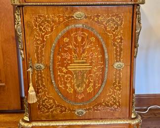 SOLD— Louis XV style Ormolu-mounted marble top cabinet with intricate wood inlay and brass details; 32x16x38