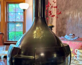 $600; Baker Furniture bronze petal vase, heavy and solid; original price was $1120; 10:dx20"h