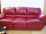 Burgandy Leather sofa with dual recliners