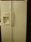 Side by Side refrigerator/with ice and water in door