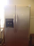 Fridgidaire by Electrolux Professional series side-by-side Frige with water and ice in door..stainless