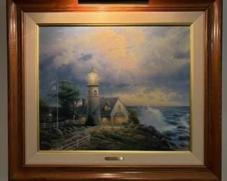 Framed Canvas Print "A Light in the Storm" by Thomas Kinkade