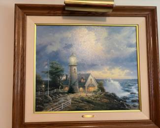 Framed Canvas Print "A Light in the Storm" by Thomas Kinkade