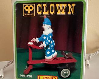 Lixin Tin Wind Up Clown Riding Scooter Toy – PMS-210