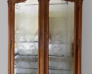 French Louis XV Style Carved Armoire With Mirrored Paneled Doors