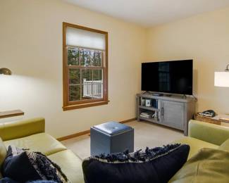 Decorative lamps, TV console and TV.