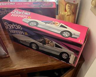Vintage Barbie Ferrari – NIB	1990s Mattel Barbie Ferrari with original packaging, unopened, collector’s piece.
