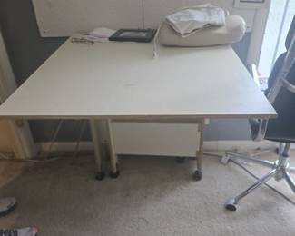 White Drop Leaf Rolling Craft Table	Sturdy laminate folding table with wheels. Great for crafts, sewing, or as extra work surface.
