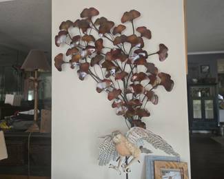 Large Metal Ginkgo Leaf Wall Sculpture	Eye-catching metal wall art featuring copper-toned ginkgo leaves. Adds dimension and nature-inspired elegance to any space.

