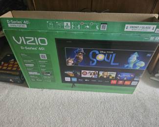 Vizio Flat-Screen TV	Large Vizio HDTV with clean screen and modern profile. Great for living room or bedroom entertainment setup.
