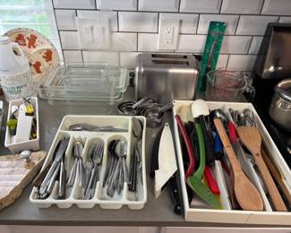 Silverware, toaster, kitchen utensils