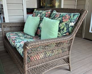 Wicker outdoor loveseat.