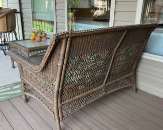 Wicker outdoor loveseat.