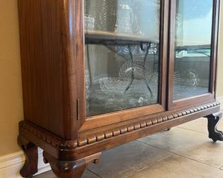 Antique curio cabinet.