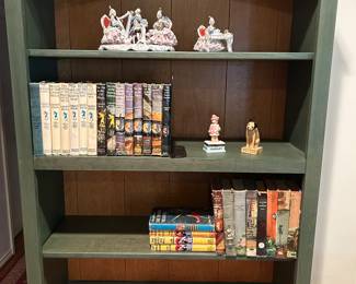 Collection of vintage books including Nancy Drew, Hardy Boys, Bobbsey Twins