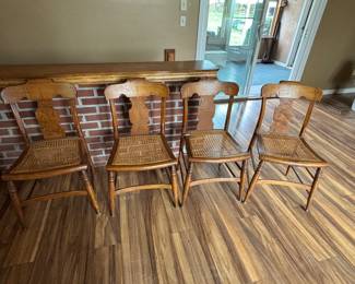 Set of 4 caned chairs