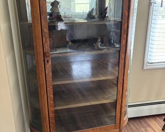 Round front china cabinet