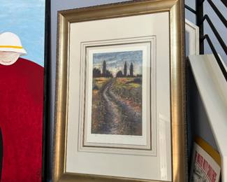 Piece of art shown with certificate of authenticity