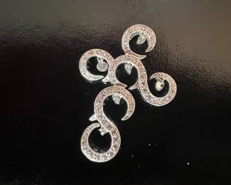 18kt gold & diamonds...shimmery cross