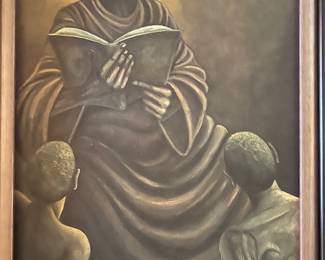 "Black Woman reading to two boys"