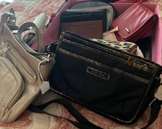 Large collection of wiomen purses and belts
