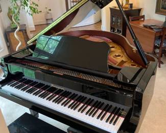 -$4,000-STUNNING EXCELLENT CONDITION BERGMANN BABY GRAND PIANO -TG-150 Black Polished Lacquer Bergmann Heritage Series baby grand piano are made with top quality materials and craftsmanship. The 4′ 11” TG-150 Model can accommodate small spaces but has the richness and evenness of sound of much larger grands. Features a Spruce Soundboard and Young Chang’s top of the line action components and felt. Original Black Piano Bench with Music Storage Included! Specifications: Dimensions: 59in. length, 57in. width, 39in. height. 88 Keys, Ebony Sharps, White Pyralin Keys. Manufacturer: Young-Chang. Professional Piano Moving Resource available for fee.