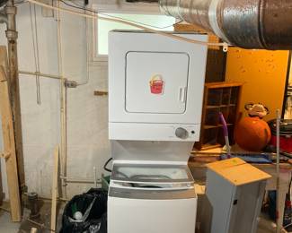 One of us brand new stackable Whirlpool washer and dryer combo 