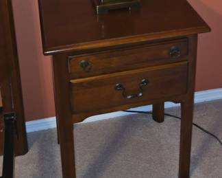 Small table could be a night stand or lamp tables