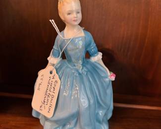 R145 - $20. Royal Doulton "A Child from Williamsburg '63". Measures 5.5" tall.