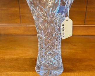 R171 - $10. Crystal Vase. Measures 8" tall x 4.5" wide.