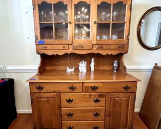 R47 - $225. Sprague of Carleton Solid Maple China Cabinet. Moves in 2 pieces. In excellent condition! Measures 54" wide x 77.5" tall (base is 35") x 20.5" deep