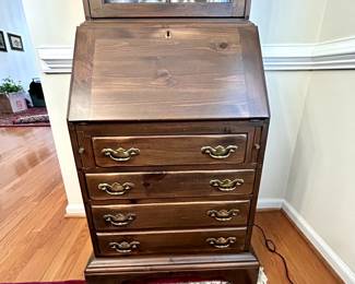 R46 - $175. Ethan Allen Secretary. Nice small desk size with narrow display cabinet on top.