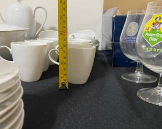 R56 - $375. Rosenthal White China. 11 - 10" dinner plates. 2 - 9" Bowls. 7 - 7.5" lunch plates. 8 - 6" dessert plates. 7 - 5" Berry Bowls. 1 - 13" oval Platter. 1 12" round serving platter. 1 Coffee Pot 8" tall.