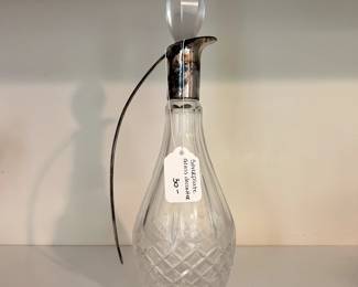 R38 - $30. Silver plated Handle Glass Decanter.