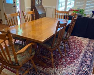 R28 - $550. Vintage Ethan Allen Trestle Dining Table - Maple & Birch. Also has 2 leaves. 2 captains chairs. 4 regular chairs. Measures 70" long x 38" wide x 29.5" tall. Each leaf is 15"