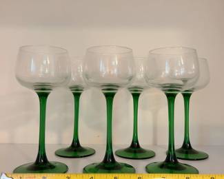 R122 - $25. Set of 6 French Glasses with Emerald Green Stems. Measures 6.5" tall.