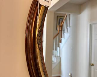 R131 - $150. Beautiful Oval Wall Mirror from Carolina Mirror Company. Measures 24" x 27".