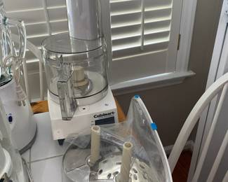 R34 - $40. Cuisinart Food Processor with extra blades.
