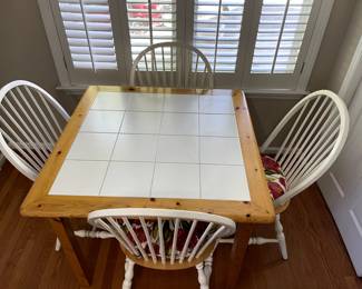 R59 - $125. Breakfast Table with 4 Chairs. Measures 38.5" square x 29.25" tall.