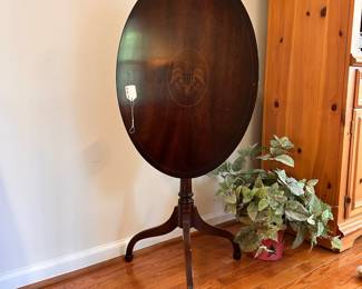 R156 - $125. Tilt Top Table with Eagle Inlay Design. Measures 26" wide x 18" x 28" tall.