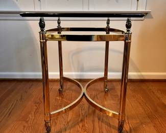 R45 - $75. Brass & Glass Side Table. Measures 20" x 27" x 22" tall.