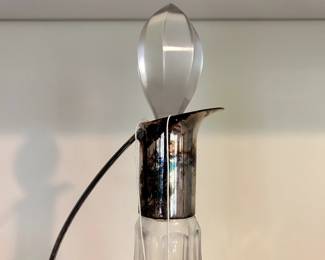 R38 - $30. Silver plated Handle Glass Decanter.