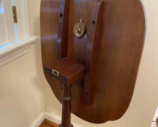 R108 - $40. Tilt Top Table. Measures 20" x 15" x 25" tall.