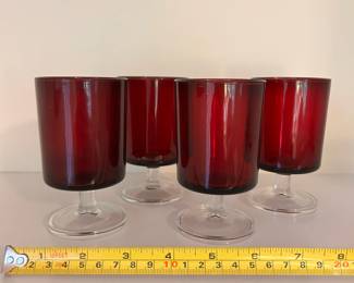 R121 - $30. Set of 4 Ruby Red Wine Goblets. Measures 4.5" tall.