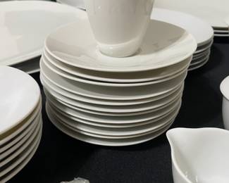 R56 - $375. Rosenthal White China. 11 - 10" dinner plates. 2 - 9" Bowls. 7 - 7.5" lunch plates. 8 - 6" dessert plates. 7 - 5" Berry Bowls. 1 - 13" oval Platter. 1 12" round serving platter. 1 Coffee Pot 8" tall.