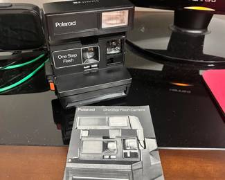 R162 - $20. Polaroid One Step Flash Camera.