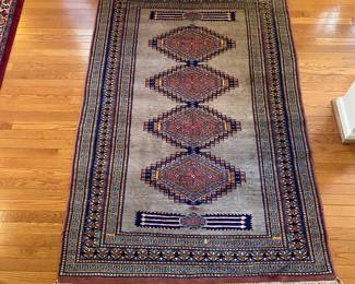 R60 - $275. Pakistan Wool Rug. Measures 73" x 50". Beautiful Condition!