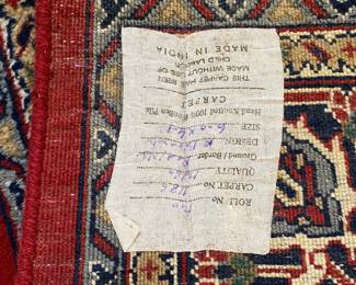 R101 - $275. Hand Knotted Wool Rug. Made in India. Measures 6' x 4'.