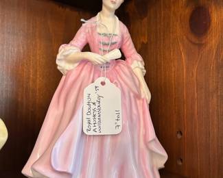 R143 - $20. Royal Doulton "A Hostess of Williamsburg '59" Measures 7" tall.