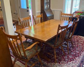 R28 - $550. Vintage Ethan Allen Trestle Dining Table - Maple & Birch. Also has 2 leaves. 2 captains chairs. 4 regular chairs. Measures 70" long x 38" wide x 29.5" tall. Each leaf is 15"